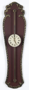 GRAVITY Wall clock with enamel dial, circa 1919, this type of clock was originally used in the mid 18th century. The movement is wound by raising the clock up the rack and allowing it's own weight to drive the mechanism, ​61cm high