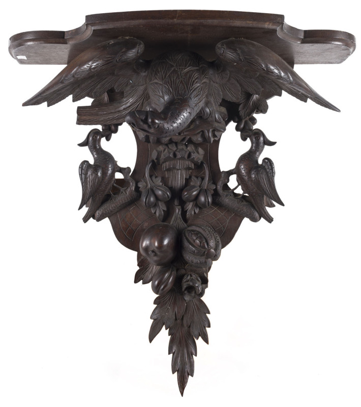 BLACK FOREST Carved eagle timber clock bracket, late 19th century, ​67cm high