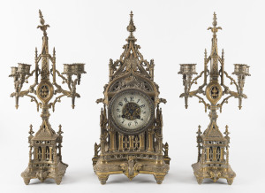 French three piece Gothic clock set in ornate brass case, 19th century, 45cm high