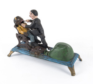 DENTIST Mechanical Bank money box, painted cast iron, 24cm across