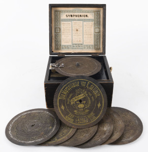 SYMPHONION German clockwork music box with metal playing disc and original lithograph instruction in the lid, late 19th century, ​12cm high, 19.5cm wide, 17.5cm deep