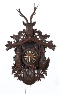 BLACK FOREST cuckoo clock with hunting motif, 19th century, 110cm high