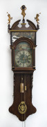 A Dutch Friesian Tail clock with painted dial surround and figured top with Atlas holding the world, alarm movement, 18th century, 188cm high