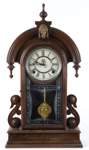 WATERBURY "Parisian", 8 day time and strike parlour clock in walnut case, circa 1886, 59cm high