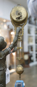 ONION BOY Mystery clock by Junghans, German, late 19th early 20th century, 8 day brass cased time piece, white metal statue standing on ebonized wooden base, 40cm high - 2