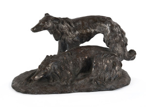 A Continental dog figure group, silver plated on copper, 19th century, signed (illegible), 28cm long