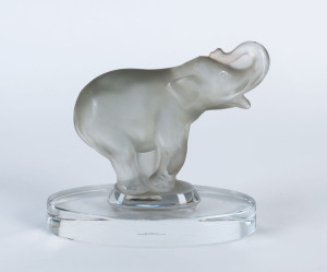 A Bohemian Art Deco glass elephant statue, circa 1920, stamped "Made In Czechoslovakia", 18cm high