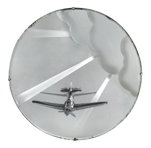 An Art Deco circular mirror with cloud decoration and chrome aeroplane, circa 1930s 46cm diameter