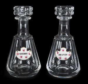 BACCARAT crystal pair of decanters with porcelain hanging labels, French, 20th century, 24cm high