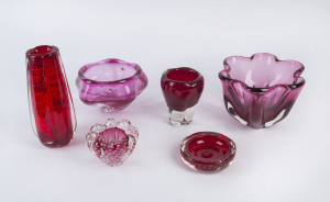 Six assorted ruby and cranberry coloured Murano glass vases and bowls, circa 1950s and 1960s, the tallest 24cm high
