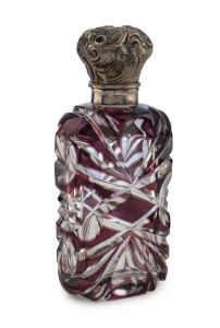 A purple overlay cut glass scent bottle with silver cap and original glass stopper, circa 1875, 9.5cm high