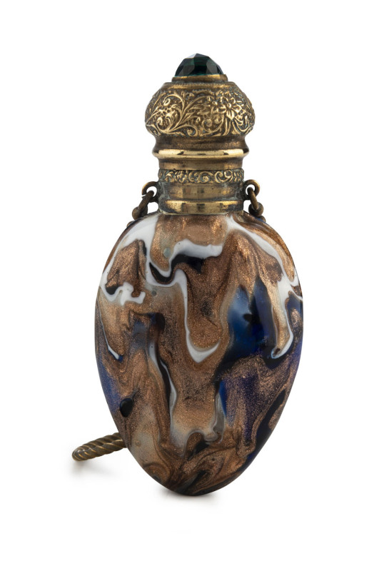 A Bohemian glass scent bottle with swirling gold inclusions, silver cap crowned with green rhinestone, 19th century, 8cm high