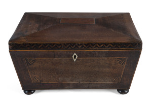 A Georgian tea caddy, mahogany and walnut with whalebone escutcheon and knobs, early 19th century, 15cm high, 26cm wide, 17cm deep