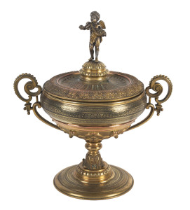 A French gilded bronze urn with figural finial top, 19th century, 24cm high