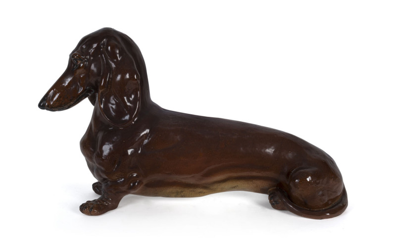 An Italian terracotta Dachshund statue, circa 1950, 62cm long