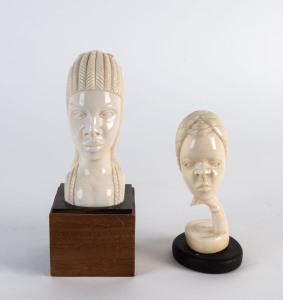 Two African carved ivory busts on timber plinths, early 20th century, 13cm and 18cm high