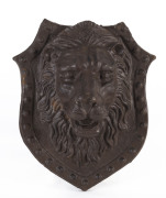 Architectural cast iron lion head plaque, 19th century, 27cm high