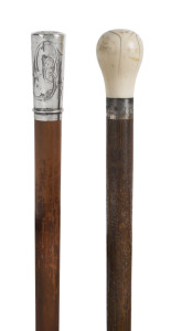 Two walking sticks, one with sterling silver top, the other with ivory handle and silver collar, 19th century 87cm and 90cm high