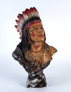 A painted chalkware bust of a native American plains Indian, early 20th century, 54cm high,