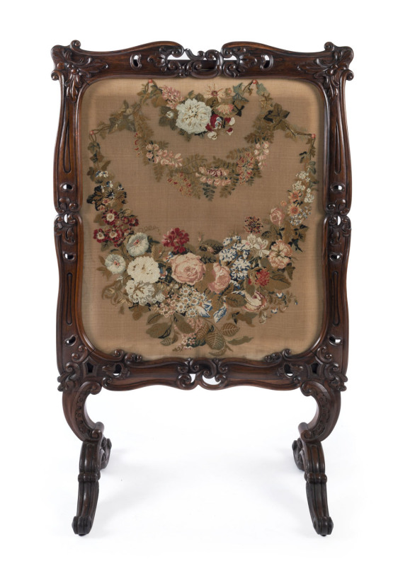 An ornate English fire screen, rosewood with tapestry panel, early to mid 19th century, 113cm high, 73cm wide,