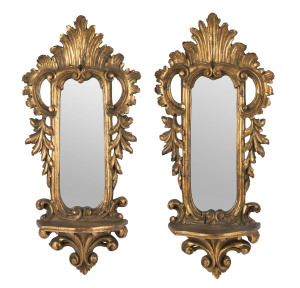A pair French carved gilt wood mirrored wall shelves, 19th century, 56cm high