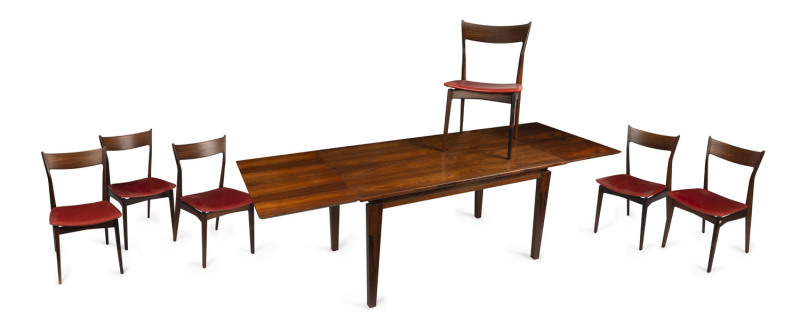 A Danish 7 piece rosewood dining stetting with drawer leaf extension and red leather upholstery, circa 1950s, 74cm high, 140cm wide (extends to 239cm), 84cm deep