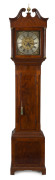 An English grandfather clock with subsidiary calendar dial, by THOMAS HADEN, Stourbridge, England, circa 1760. Fine mahogany case with string inlay and brass mounts, 217cm high