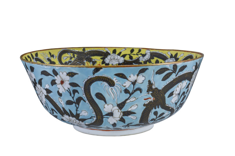 A fine Chinese porcelain bowl decorated with dragons amidst floral motif, glazed in Imperial yellow and turquoise ground, 19th century