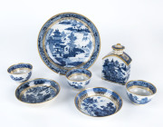 Chinese blue and white porcelain tea caddy, tea bowls, saucers and serving bowl with European gilded highlights, 18th century, the caddy 13cm high