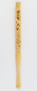 A Chinese carved ivory cigarette holder, late 19th early 20th century, 17cm long