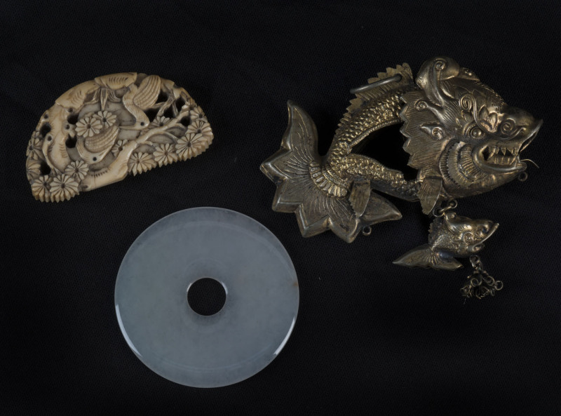 Chinese jade pi disc, ivory carving and a gilt metal dragon fish pendant, 19th century, the disc 5cm diameter