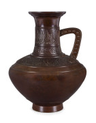 A Japanese bronze ewer with seal mark to base, Meiji period, 23cm high