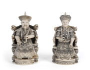 A pair of Chinese carved ivory ancestral figures with two character seal mark to base, circa 1920s, 13.5cm high