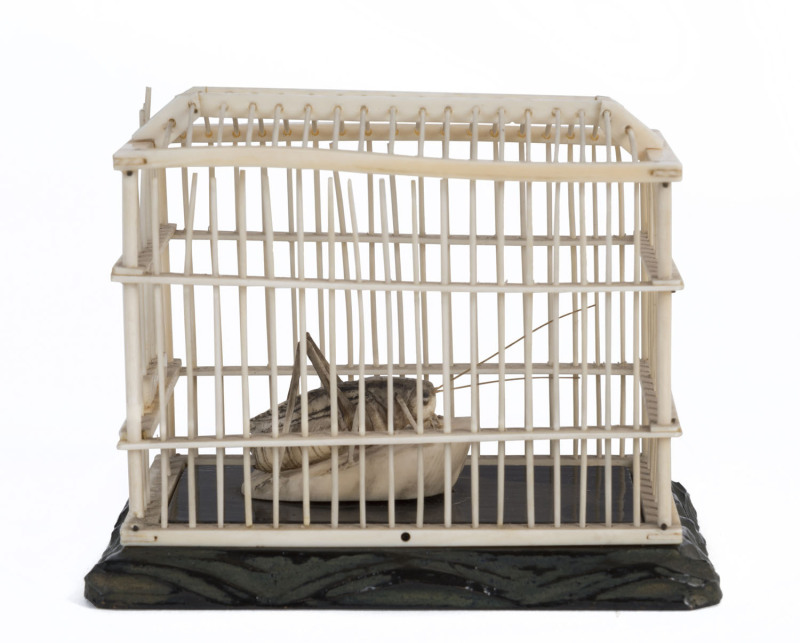 A Chinese carved ivory cricket cage with carved cricket on wooden base, Qing Dynasty, 19th century, 8cm high, 10cm wide, 6cm deep