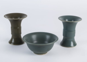 Two Chinese green glazed vases and a bowl, 20th century, the vases 10cm high