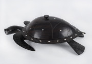 A Fijian turtle kava dish with lid, carved wood and mother of pearl, late 20th century, 61cm long