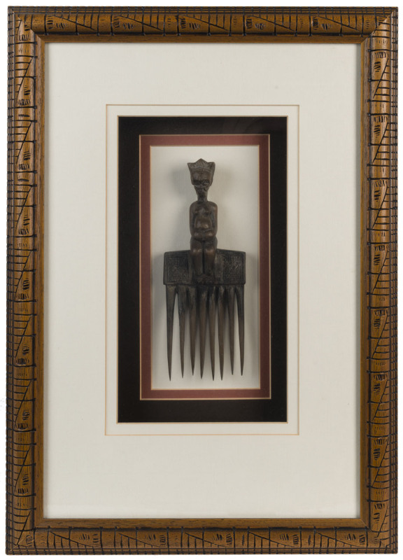 Two South African tribal artefact framed displays, the larger 48 x 57cm overall