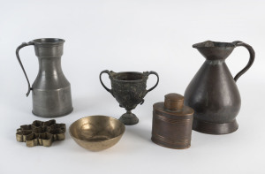 A copper tea caddy, antique copper measure, pewter ale jug, brass biscuit cutter, brass bowl and bronze vase, the tallest 25cm high