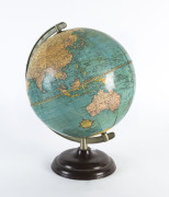 Crams Universal 10Â½" world globe on a tin base,