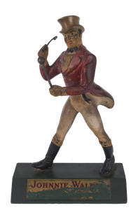 JOHNNIE WALKER point of sale advertising statue, celluloid and timber, early 20th century, 35cm high