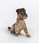 A cold painted cast metal statue of a terrier, circa 1900, 12cm high