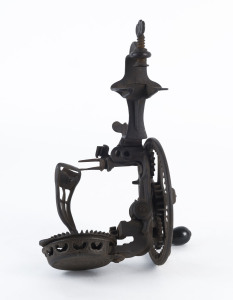 "The Reading Hardware Company" American hand cranked apple corer, iron and timber, 19th century, 26cm high