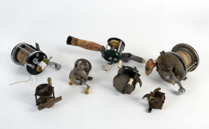 Seven assorted vintage fishing reels by Lashless, Atlas, Shakespeare and Penn, 20th century