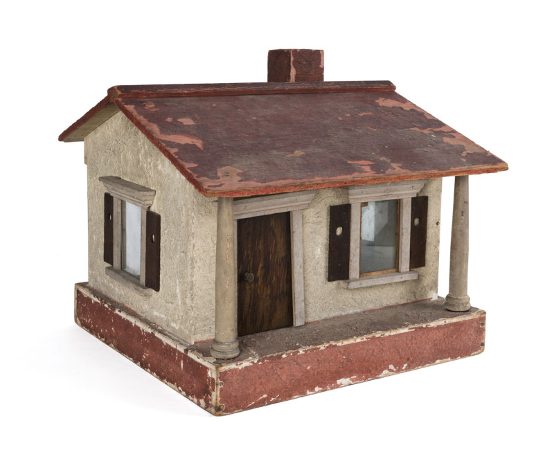 A vintage folk art dolls house, painted wood, early 20th century, 30cm high, 33cm wide, 33cm deep