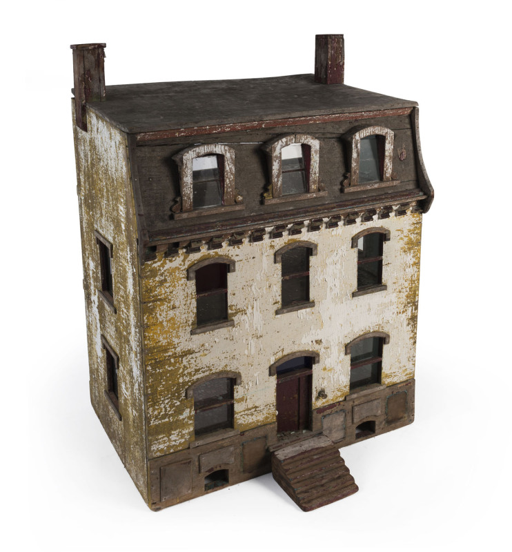 An impressive three storey dolls house in the Georgian style, early 20th century, 122cm high, 80cm wide, 56cm deep