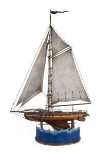 A French model pond yacht on hand-painted stand, circa 1940s, 109cm high