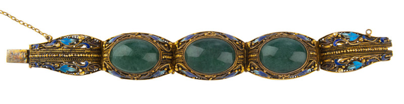 A Chinese bracelet, gilded silver and enamel set with jade, early 20th century, stamped "Silver", ​18cm long