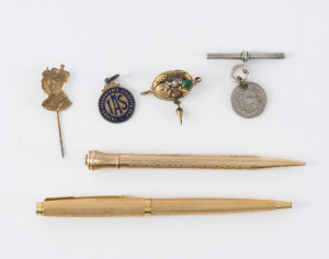 Gold plated Nupoint pencil, Parker gold plated pen, antique pinchbeck brooch, Royal pin, and two fobs, 19th and 20th century,