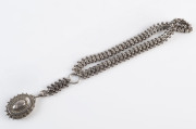 An antique sterling silver necklace and locket, Birmingham, circa 1884, 52cm long, 64 grams total