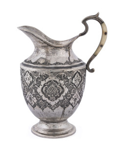 An Antique Persian silver cream jug, 19th century, stamped "84", 13cm high, 150 grams